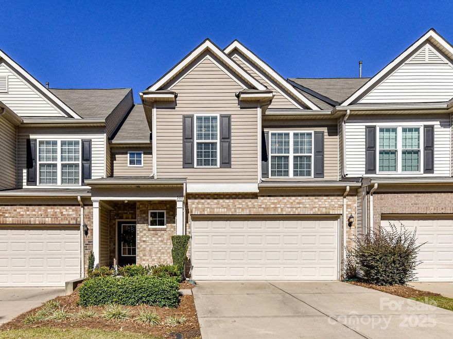 Don’t miss this beautiful, move-in-ready townhome located in the gated community of Park South Station. This 3-bedroom, 2.1-bath home features 9-foot ceilings, a fireplace, a 2-car garage & hardwood floors on the main level. The kitchen is complete with breakfast bar, white cabinets, gas range and pantry. Upstairs, the primary suite features a huge walk-in closet and an ensuite bathroom with a double vanity, shower, and water closet. Two additional bedrooms, walk-in laundry room and full bathroom complete the second level. Recent updates include fresh paint (all ceilings & 2nd floor), Nest thermostats, garage shelving, new garage system, and a new dishwasher. Step outside to a fenced backyard and a patio. Yard maintenance is covered by the HOA. Park South Station offers resort-style amenities, including a pool, clubhouse with fitness center, dog parks, and a playground. This home is located on a quiet dead-end street with no through traffic and just a few homes down, there is direct access to the Sugar Creek Greenway.