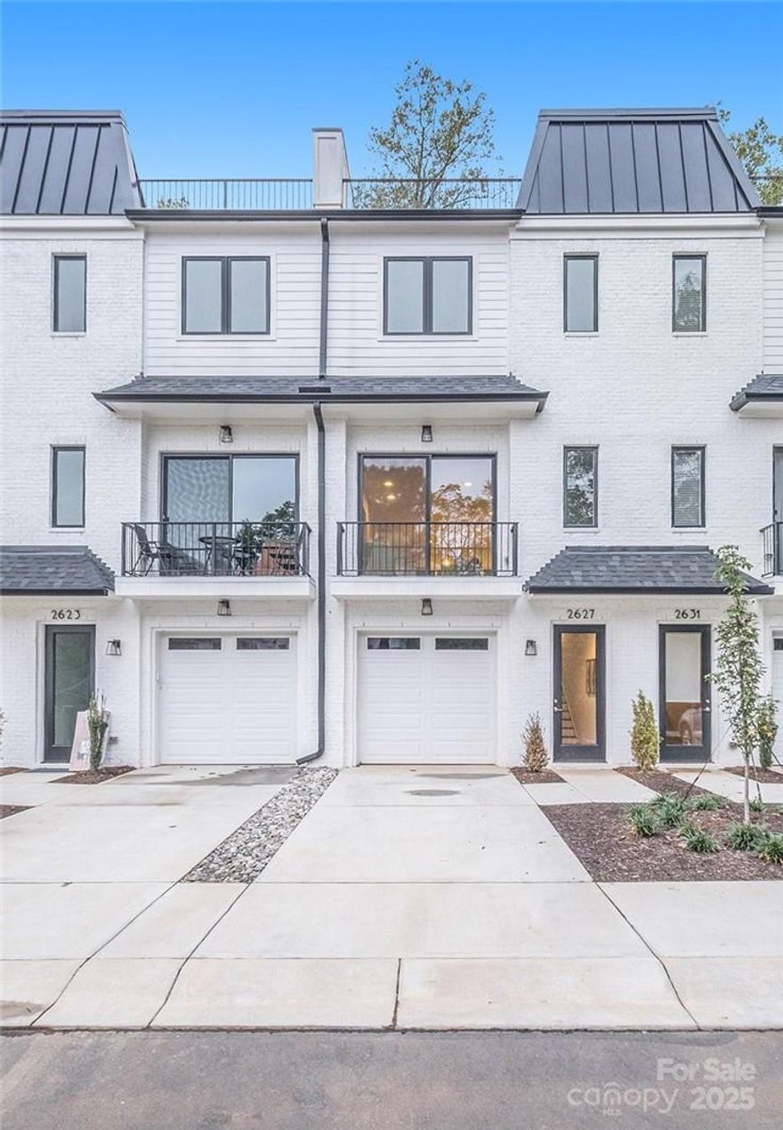 Built in 2022 by Sixteen Penny Construction, this three-story townhome combines thoughtful design, high-end finishes, and a premier location in SouthPark. With 3 bedrooms, 3.5 bathrooms, and 1,707 square feet, this modern residence offers both comfort and convenience. Each of the three bedrooms features an ensuite bathroom, providing privacy and flexibility. The open-concept main level is ideal for entertaining, showcasing a gourmet kitchen with Electrolux appliances including a gas range, a spacious island with overhang for seating, and a dry bar perfect for serving cocktails or coffee. Sleek lighting throughout the home enhances the modern aesthetic. Upon entry, you’re welcomed by a drop zone for easy organization and a direct connection to the attached one-car garage. Additional parking includes a driveway space plus guest parking onsite. One of the home’s standout features is the private rooftop terrace, offering a peaceful retreat for morning coffee, evening gatherings, or simply taking in the views. The townhome’s lock-and-leave design and landscaping included in the monthly HOA dues make it ideal for those seeking a low-maintenance lifestyle without sacrificing luxury or location. Perfectly positioned along the Little Sugar Creek Greenway, this home offers direct access to miles of walking and biking trails while being just moments from SouthPark’s premier dining, shopping, and entertainment destinations. Whether you’re looking for a primary residence or a convenient in-town retreat, this property delivers an exceptional blend of urban accessibility and modern comfort. Additional highlights include sleek contemporary finishes, ample natural light, and a functional floor plan that maximizes space and flow across all three levels.  Enjoy the best of SouthPark living, modern design, low maintenance, and access to everything Charlotte has to offer, all from this beautifully appointed townhome on the Greenway. Please see attached fixture replacements for updated Kitchen Island Pendants and Primary Bathroom mirror and vanity lights. Seller also adding a surround to the electric fireplace and shelving at the dry bar. If Buyer finances with our preferred lender, Buyer becomes eligible for a 2% rate buydown and an additional $2,000 credit from Lender.