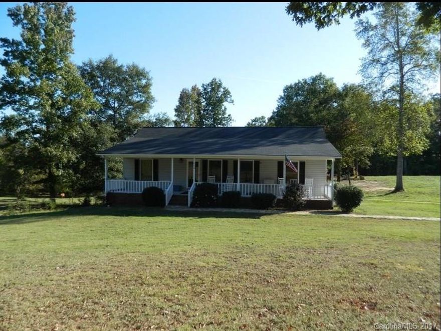 Want your own little piece of country living?  Fabulous front porch length of house!  Split bdrm plan with fireplace in great room, updating in flooring, paint, light fixtures, some appliances, in recent years.  New HVAC 3/2014,
new roof, exterior paint, both decks resealed all in Nov 2016 per seller.  Easy to add another bdrm, walk in closet, bath and storage in basement....already has great rec room and office/craft room.  Lot of piece and quiet, animals, make your own garden!