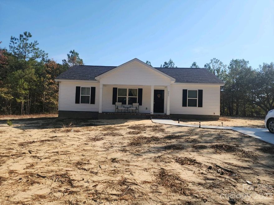 Don't miss this 2023 year built ranch, in almost new condition!  It features an open floor plan, living/dining/kitchen with island and split bedroom plan.  The primary bedroom and bathroom feature a soaking tub and separate shower.  The other two bedrooms share easy access to the full hall bathroom.  The large laundry room located adjacent to the kitchen, features a linen closet and panty. There is a concrete driveway and detached storage. There is no wasted space in this floor plan. Enjoy the front covered porch. This property is located within a conveniet distance of Cheraw State Park and other area amenities.