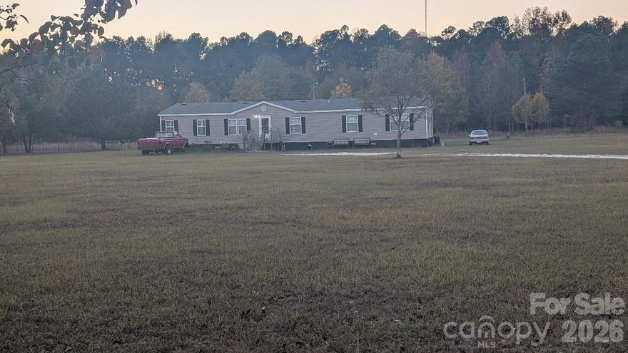 Welcome to your country retreat! Nestled on over 3 acres of beautiful, open flat land, this spacious 4-bedroom, 2-bathroom home offers the perfect blend of peace and quiet.

Step inside to discover a warm and inviting interior, perfect for family living and entertaining. The generously sized rooms offer ample space and storage.

Plenty of space for gardening, animals, or even a hobby farm.