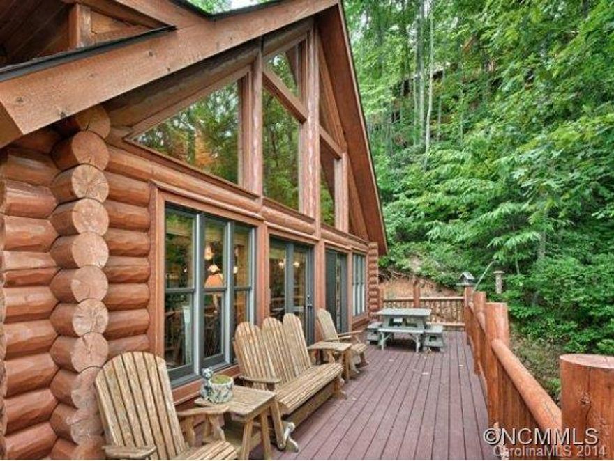 It's called Hiawatha.  This absolutely fabulous log home with sensational view is, as we say, EPIC-spacious open floor plan; bright great room with wall of windows to capture the exceptional scenery, a soaring ceiling and river rock fireplace; and two large master suites.  And there's more.  The downstairs boasts a large rec room with wet bar and bonus room to accommodate overnight guests.  All furnishings are picture perfect and negotiable.