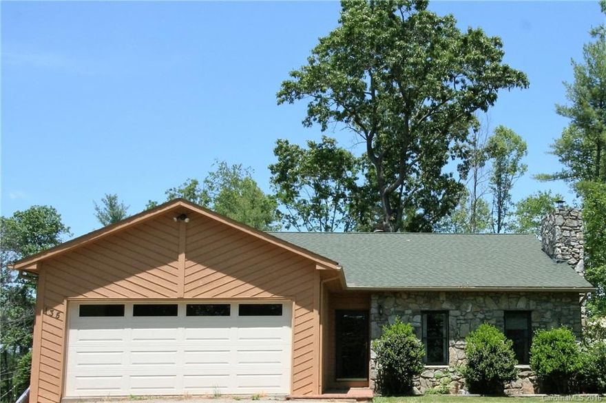 huge long range views, private equestrian setting overlooking pastures.  Contemporary home/skylights, large stone frpl. 2 yr. new screened,covered porch to enjoy watching the views, livestock.  20' x 20' 2 stall barn built in 2008 has water and electric with riding ring that enjoys 180 degree views.  So much outdoor space to enjoy tranquil setting.  Each bedroom has outside access; master has French doors onto deck/views; fruit trees, fenced pasture.  Must see to appreciate; just 20 min.Ashevill