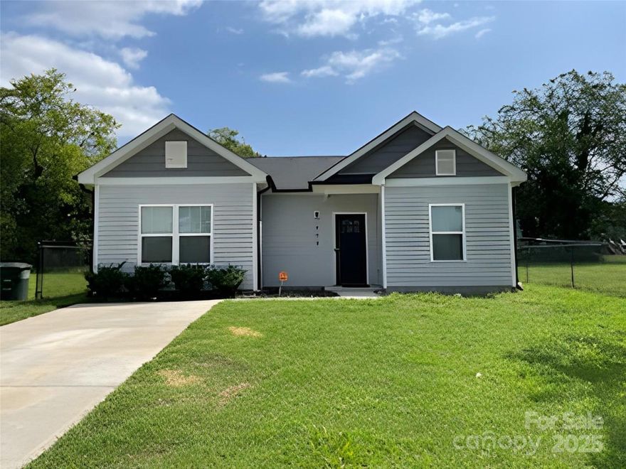 Welcome to this 3 beds, 2 baths dream home in Gastonia, NC! This stunning residence boasts an open floor plan with vaulted ceilings, providing a spacious and airy feel throughout. Enjoy the elegance of luxury vinyl plank flooring and modern lighting fixtures in every room. The kitchen is a chef's delight, featuring an island, all stainless steel appliances, and 9-foot ceilings. Admire the exquisite Carrara marble countertops, subway tile backsplash, and 42" tall shaker-style kitchen cabinets with soft-close functionality. The premium finishes extend to the bathrooms, which also feature Carrara marble-topped vanities and ceramic wall tiles. It also has dedicated laundry room located just off the kitchen. The primary suite offers a tranquil retreat with a walk-in closet, ensuring ample storage space. It is partially fenced, providing a perfect blend of openness and privacy. Don't miss the opportunity to make this beautifully appointed home yours.