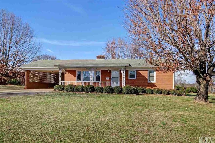 Such a convenient location! Walk to restaurants, grocery store, shopping, etc! Exceptionally well maintained all brick ranch home. Located on E. Broad St. next to shopping center yet so peaceful and private backyard surrounded by a privacy fence! Home offers 3 bedrooms and 1 bath. Original hardwood floors in all bedrooms and hall with hardwoods under living room carpet as well. Cozy kitchen and dining with eating bar as well as pantry cabinet and built in hutch/cabinet. Windows already replaced.