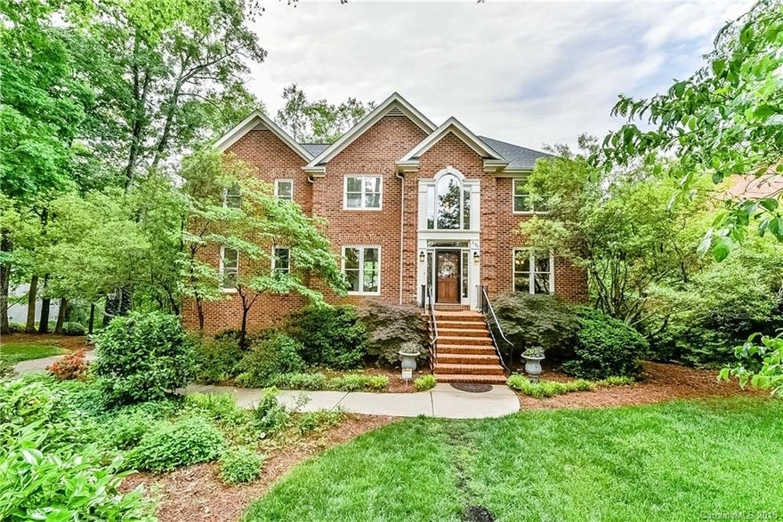 This is a MUST SEE! Exquisite 4 bed/3.5 bath full brick home in desired Beacon Knoll! Master suite on main level with French doors onto a screened porch oasis, en-suite, walk-in & custom shelving. Spacious great room, fireplace, wet bar & Brazilian cherry floor accents. Open kitchen with large island, breakfast nook, and large bay window overlooking the manicured yard. Finished basement w/ kitchenette & full bath. Two decks, covered patio. Pleasant Rd is easy access to I-77 - miss the traffic!