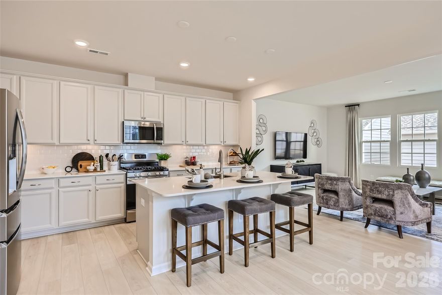 This former model home is ready for its very first owner! Situated as a desirable end unit, this townhome is filled with natural light throughout. The main level offers a versatile office or study—perfect for working from home or flex living space. The kitchen features a gas range, quartz countertops, and a layout designed for both everyday living and entertaining. Upstairs, you’ll find three bedrooms including a comfortable primary suite retreat. Located within the highly sought-after Fort Mill school district, this home also benefits from community amenities currently under construction and scheduled to open later this year—adding even more value to an already exceptional opportunity.