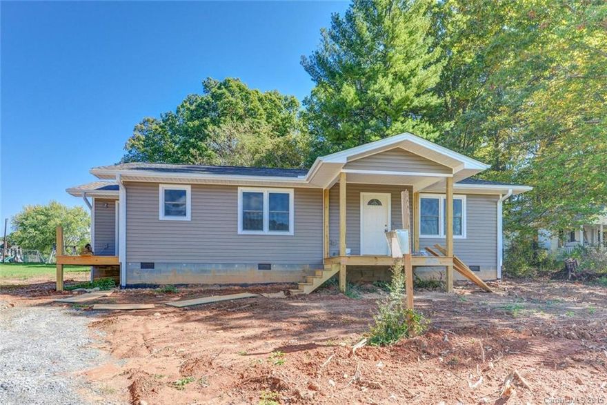 Fully renovated ranch home with year round mountain views! This 1200+/- SqFt home features: 3 Bedrooms, 2 Bathrooms, Open Floorplan, Mud Room, 3" Pre-Finished Hardwood Floors in Main Living Spaces, Covered Front Porch, Double Hung Windows, Tile in Bathrooms and Mud Room, Carpet in Bedrooms, Large Kitchen with Island, Covered Front Porch and year round views of the mountains! Estimated Completion in November.