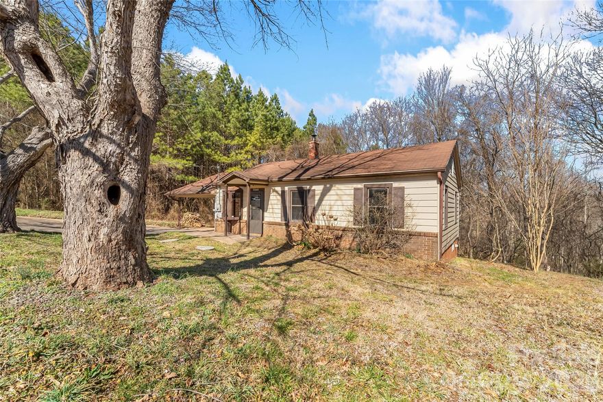 Acreage in Mountain View with river frontage! So much opportunity for expansion, new construction or whatever you decide! Charming single family home on 14.53 acres in the Brookford/Mountain View area! Land adjoins Henry Fork River. Home is located outside of city limits but still close to Hwy 321, Hwy 70 and I40. Private well. New forced hot air furnace, new water heater, new Septic System in 2019, recent concrete pour for the basement and wood stove added. Minutes from shopping and dining while still maintaining a private feel.