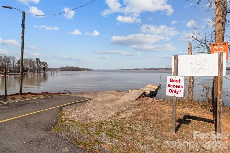 Summer Place! Located on High Rock Lake! Bring your boat! Summer is just around the corner! Owning this lot allows you access to the Community boat ramp, several picnic areas, and lots of fun on the water!Come check out this great lot. (There is a NEW MEMBER KEY FEE of $20.00- KEY FEES ARE OPTIONAL-$20.00 first key,$60.00 a second key-Both ONE TIME FEES) The county has no records of this lot being perked, I do have a report from LEY in the attachments where the lot was perked in Jan. of 2025. and turned down. This can still be a great investment for utilizing the boat ramp and the picnic areas, Get in while the pricing is reasonable.