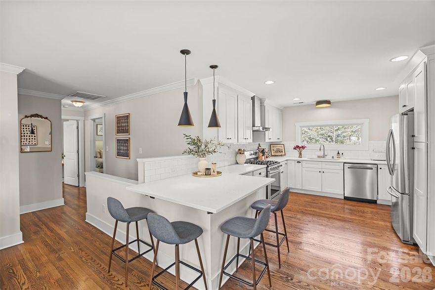 Welcome to this fully renovated mid-century ranch with a finished basement in one of Charlotte’s most sought-after locations. Just minutes from SouthPark, Uptown, and some of the city’s best dining and breweries.
Designed with a clean, modern aesthetic and thoughtful upgrades throughout, the main level offers an open, light-filled layout anchored by a beautifully updated kitchen featuring quartz countertops, soft-close cabinetry, subway tile backsplash, and stainless steel appliances. Hardwood floors flow seamlessly through the main living spaces and into the well-appointed bedrooms. The primary suite on the main level, feels like a true retreat. Complete with custom wainscoting, dual closets, double vanities, and a sleek frameless glass shower.
Downstairs, the fully finished basement adds incredible flexibility with a spacious second living area, dedicated office, additional bedroom, full bath, and laundry - ideal for guests, and working from home.
Step outside to a large, private, fully fenced backyard with endless potential. Whether you envision a pool, garden, or an outdoor entertaining oasis, this offers the space to create it. 
With over 2,000 sq. ft.  of versatile living space and an unbeatable location, this home offers the perfect blend of style, function, and convenience.