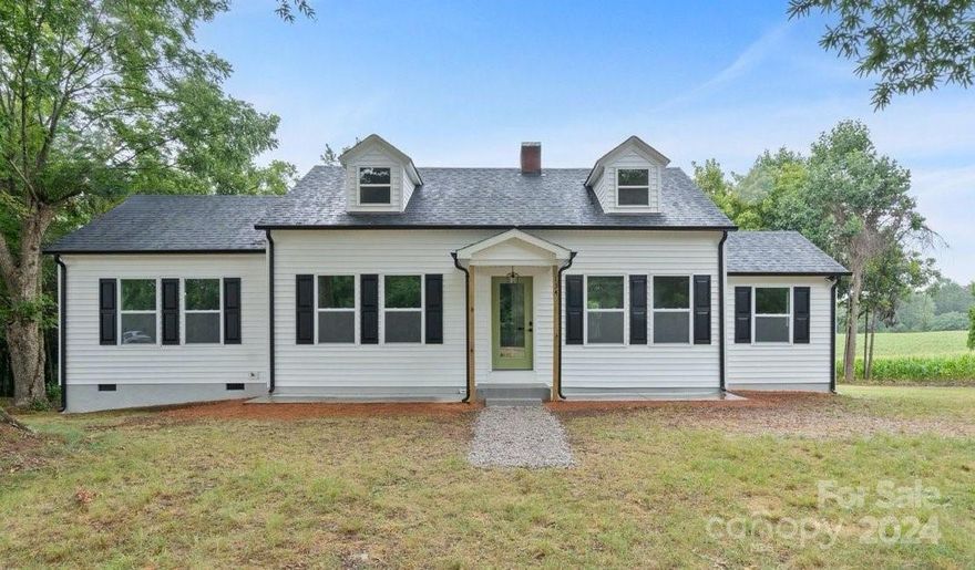 Welcome to this charming 2-acre property, where the beauty of the past meets the comfort of the present! This newly remodeled 1955 Cape Cod-style home is a true gem, boasting a warm and inviting atmosphere that's perfect for relaxation and entertainment. As you step inside, you'll be greeted by the warmth of the all-new finishes, which includes new flooring, crisp white trim, and a palette of soft, soothing colors. The thoughtful floor plan is designed to provide ample space for living, dining, and cooking, with a focus on functionality and flow. The open concept living area is perfect for family gatherings or cozy nights in, with a living room that flows seamlessly into the dining area and kitchen. What really sets this property apart is its incredible outdoor space. The 2-acre lot offers plenty of room to roam, with plenty of mature trees providing shade and privacy. Come check it out today!