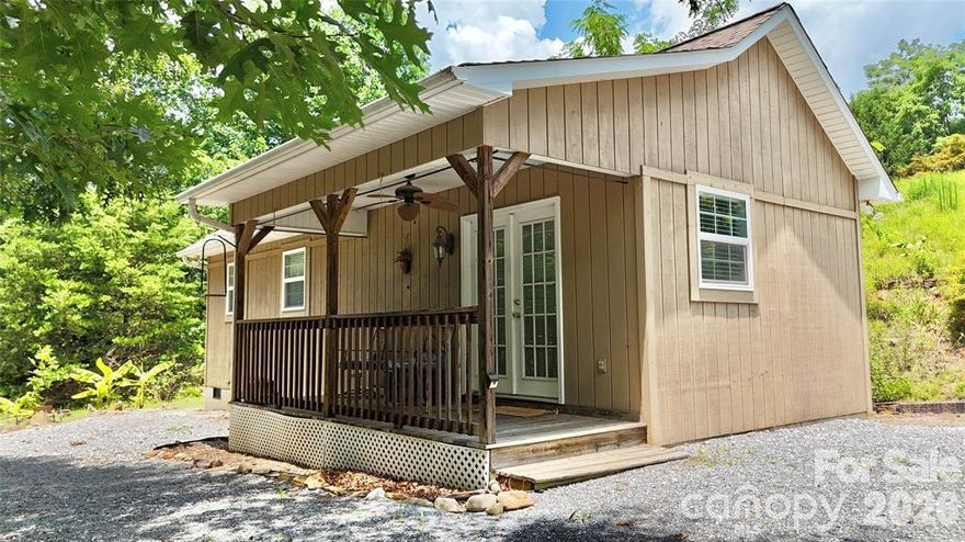 This charming one-bedroom, one-bathroom cottage is located in Barefoot Landing Camping Resort, a gated community that offers both privacy and easy access to all the fun the resort provides. It’s an excellent choice for personal use or as an investment, with the option to rent short- or long-term, as permitted by the resort. About one-tenth of an acre will be officially surveyed and parceled off, with the process completed at closing.

The cottage offers a warm, inviting layout—perfect for weekend getaways or year-round living. Residents enjoy access to resort amenities, including a community pool, private cove on Lake James, basketball and volleyball courts, a playground, and a newly built pet park—something for everyone.

Whether you are seeking a full-time residence, a vacation home, or a rental property, this cottage presents a rare and valuable opportunity in a desirable resort community.