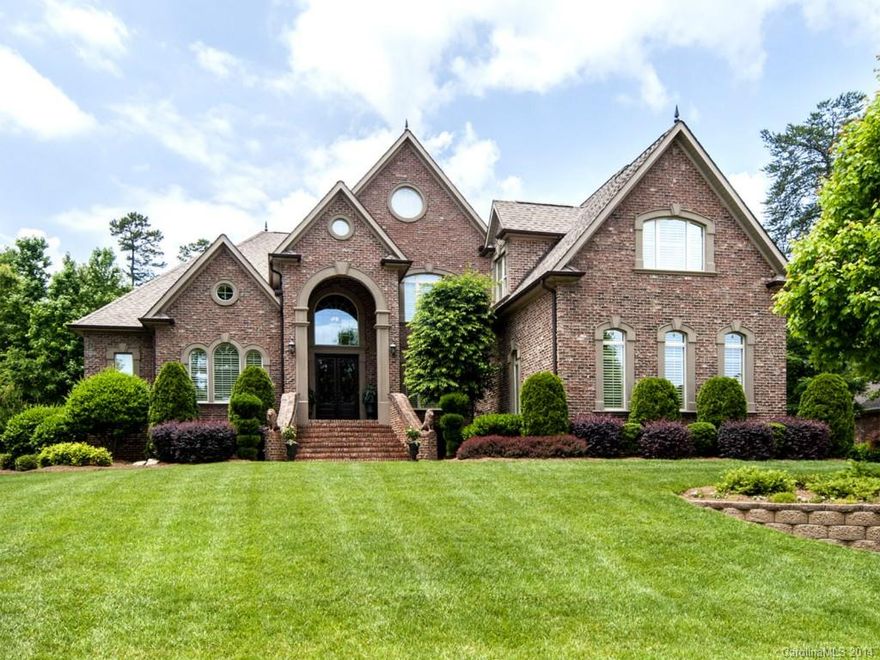 This sophisticated estate home is sure to impress & features only the finest of details throughout including gleaming marble floors in the entry, showcase stairway, gourmet kitchen with Jenn-Air appliances & private library w built-ins. Plantation shutters. The master suite w fireplace, tray ceiling & spa-like bathroom. On the second floor, 3 bedrooms w their own private bath & huge billiard/bonus room. Sitting on nearly an acre w custom landscape. Basement workshop & oversized garage.