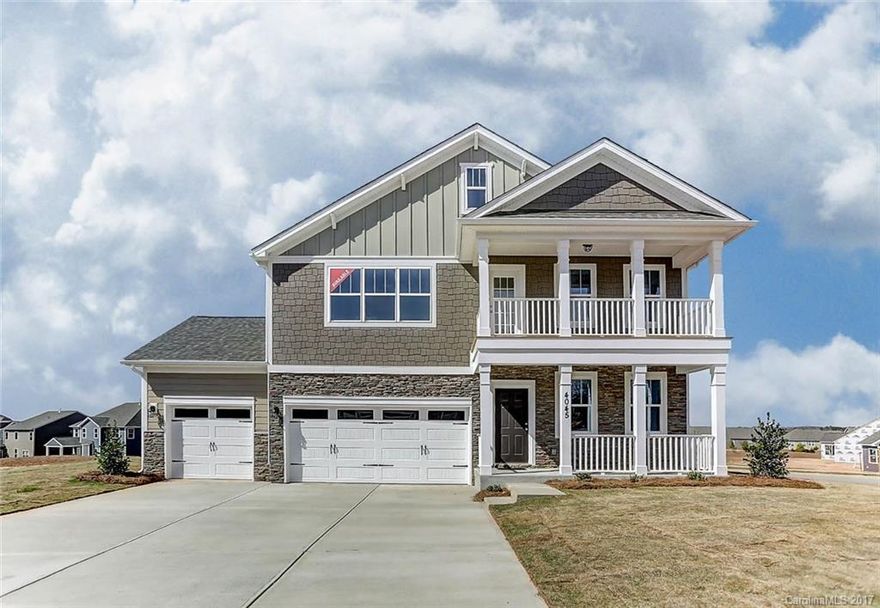 Wonderful plan with plenty of space and a utility garage! Upgraded light & plumbing fixtures, interior trim package & two-tone designer paint, iron rail & pickets, stamped carriage style garage door & upgraded flooring!  Designer Kitchen  includes upgraded maple cabinets & hardware, granite countertops with ceramic tile backsplash and stainless appliances! Come see this gorgeous new home today!