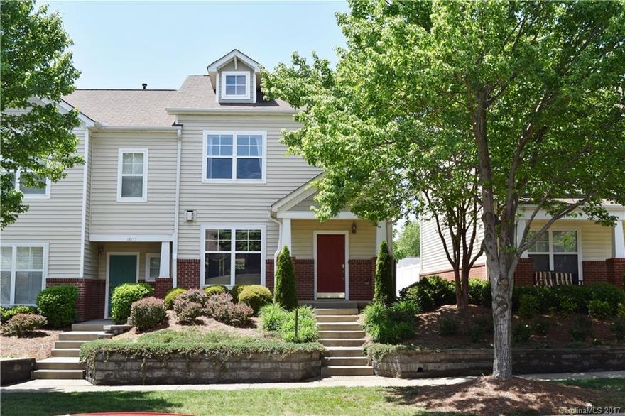 Fabulous End Unit in Highly Sought After Area.  Spacious open floor plan with laminate wood floors throughout main level.  Large Great Room with Cozy fireplace, open to spacious dining area.  Kitchen has Granite countertops and spacious island with sink & eating area. 3 nice bedrooms up. Master suite features walk-in closet & private bath.  Newly fenced back yard and two parking spaces in rear.Walking distance to all neighborhood amenities as well as easy access to McDowell Greenway to Birkdale.