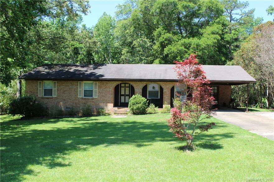Brick one story with a covered front porch and enclosed rear porch. NO HOA! Gas-Pack replaced approximately 1.5 years ago.  Workshop with electricity. Security system through Comporium is in place with indoor and outdoor camera. This system can transfer with no additional transfer fee. Low County taxes.
