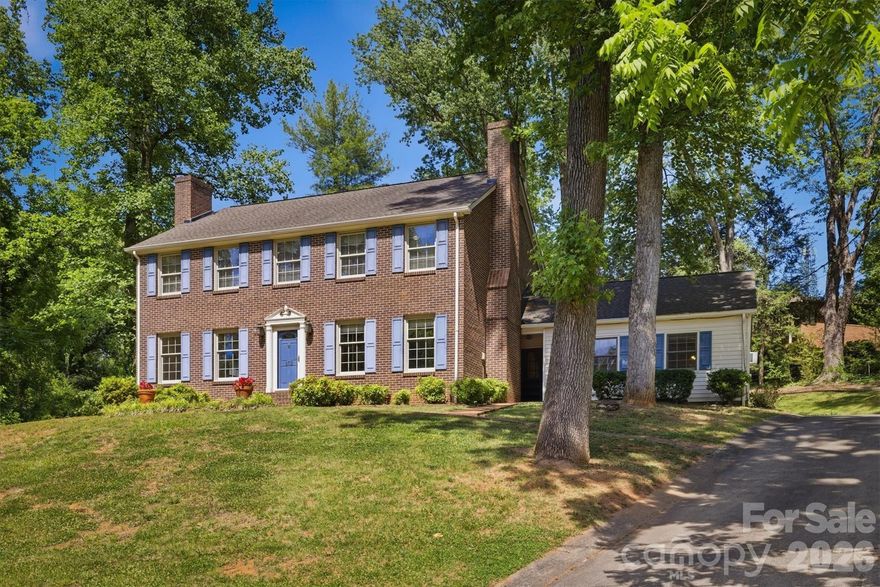Discover timeless charm and exceptional space in this executive-style home located in the heart of Morganton. This full brick residence offers 4 bedrooms, 2.5 bathrooms, and an abundance of flexible living areas designed for both everyday living and entertaining. The main level features an eat-in kitchen with updated appliances, a pantry, formal dining room, spacious living room w/ fireplace, and a study with a 2nd fireplace. Just off the kitchen, you'll find a large family room featuring a kitchenette and half bath, creating the perfect space for gatherings and recreation. Upstairs, find 4 generously sized bedrooms, including a large primary bedroom with an ensuite full bath and private exit to the home's HUGE sundeck, which is partially covered and screened in. This home's sundeck was just professionally remodeled! The basement adds even more versatility with 2 finished rooms plus an unfinished workshop/storage area. Throughout the home, you will enjoy the amount of storage and functional space. Outside, the property includes an attached double carport along with an additional workshop. This well-cared-for home is ready for your personal touch.