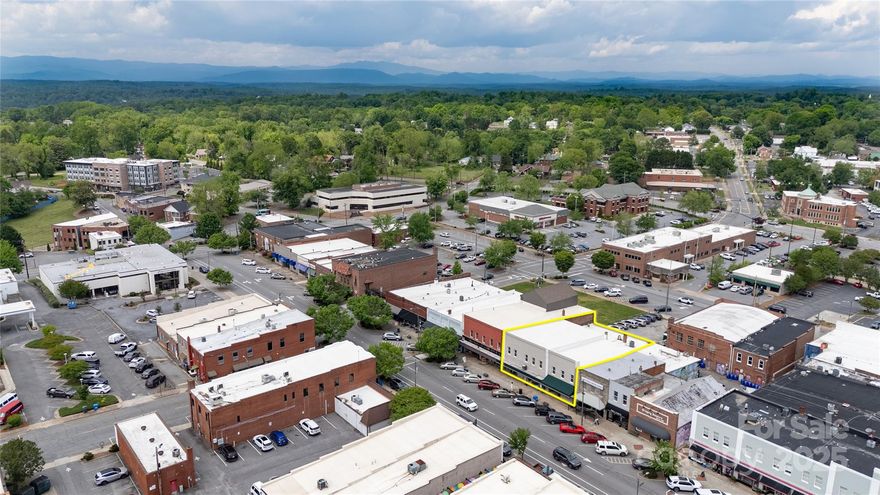Iconic 1901 landmark in the Heart of Downtown Morganton. Endless Potential Across Three Street-Level Storefronts and Expansive Upper Level. Own a piece of Morganton’s history with this striking 1901 commercial building, perfectly positioned in the vibrant heart of the Historic District. Spanning three street-level addresses 118, 120, & 124 N Sterling St — this rare offering combines timeless charm with flexible space. Currently home to professional offices, a retail shop, and a local snack bar, the property features: Three high-visibility storefronts with strong foot traffic and individual entrances. A large upper-level open floor-plan with soaring ceilings and limitless potential — ideal for loft-style apartments, event space, creative studios, or additional commercial suites. Prime visibility in one of downtown Morganton’s most walkable, bustling blocks. Whether you're an investor, entrepreneur, or visionary developer, this is your chance to bring new life to the heart of downtown.