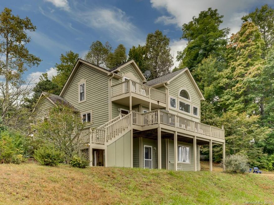 The ideal mountain retreat! Sit on your deck and enjoy multi-range mountain views for miles. Nice updated kitchen open to living/dining area with views. Bedroom/bath suites on each level with two bonus rooms. Close to dining, shopping, rivers, hiking trails and easy access to airports. Overlooks gamelands/forest!