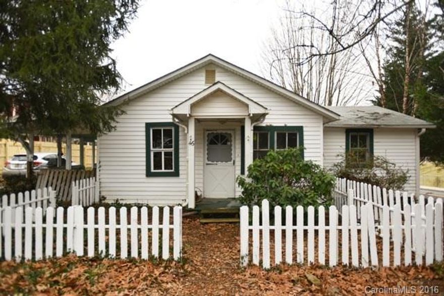 Adorable Oakley cottage with charming vintage touches! Enjoy three bedrooms PLUS a bonus room w/built in shelving, as well as dedicated laundry and dining. Efficient wood stove keeps you toasty and saves you $$. 2-story loft-style workshop out back complete with chicken coop. Yard sown with beautiful perennial and apple trees. Brand new oil furnace and only 3-year old roof to boot! Walk to Oakley Elem., playground, park, and Biltmore Village. Has been a snap to rent, last tenant paying $1200/mo.