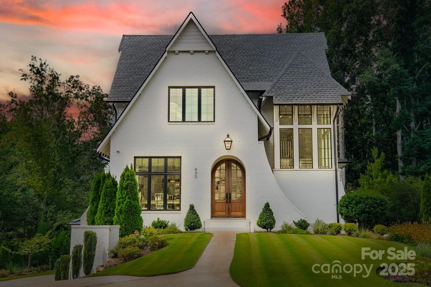 Rare opportunity in gated Bramble, a private cul-de-sac enclave within Baxter Village, yet with its own HOA for added privacy. Built by New Old, LLC, this luxury residence features a chef’s kitchen with marble countertops, a large island, a 48" Wolf range, Sub-Zero appliances, and a separate scullery. Wide-plank hardwoods, reclaimed beams, and marble finishes run throughout. Two primary suites and a fully finished lower level provide flexible living. Outdoor retreat offers a heated pool, hot tub, and two screened porches with motorized screens. Located in award-winning Fort Mill Schools, close to Baxter’s dining, shops, and events, and minutes to I-77, the Greenway, and Charlotte. Fourth bedroom intended as a bedroom, no closet.