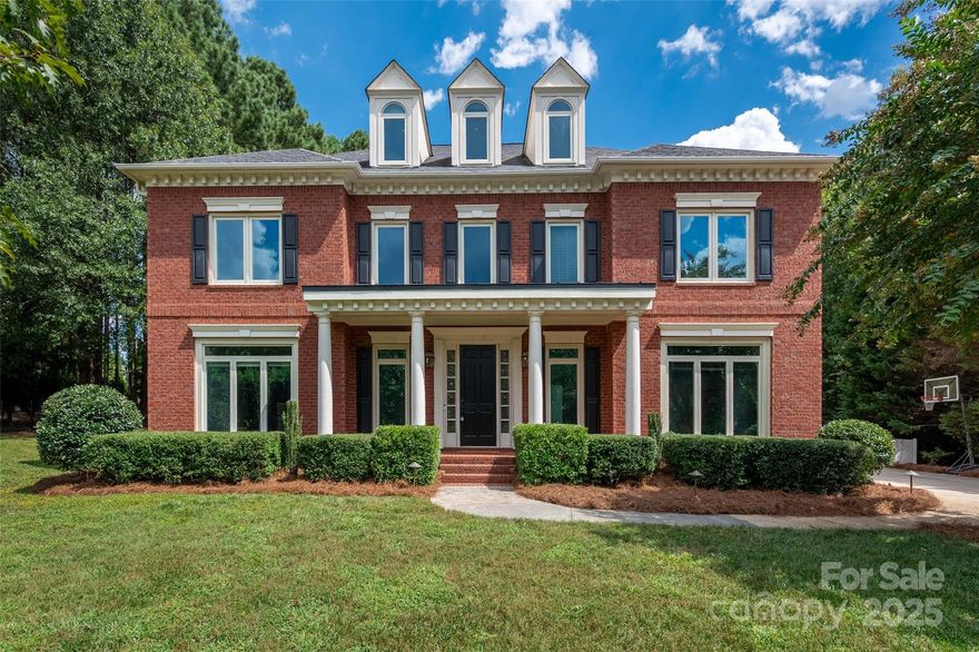 Located in the highly desirable Bridgehampton neighborhood within the sought-after Ardrey Kell school district, this all-brick home sits on a private cul-de-sac lot with a fenced backyard. Featuring a 3-car garage, screened porch, and ALL NEW UPGRADED CASEMENT WINDOWS, it’s move-in ready. Inside, hardwoods run throughout the main level, where a bright white kitchen opens to the spacious family room with gas logs. Study/office with French doors and formal dining room with gorgeous wallpaper on the main level.  Upstairs, you’ll find the primary suite with an updated primary bath and a flex space with a balcony, three additional bedrooms (one BR is ensuite and the other two have a Jack and Jill bath), and a bonus room with built in desks and bookcases. The 3rd floor offers even more flexibility with a bedroom, full bath, and a large bonus with a wet bar and beverage refrigerator.  Projector, screen, and ping pong table are negotiable. 
 Make sure to visit the Bridgehampton amenities that are second to none—pool, tennis, pickleball, playground, and clubhouse.