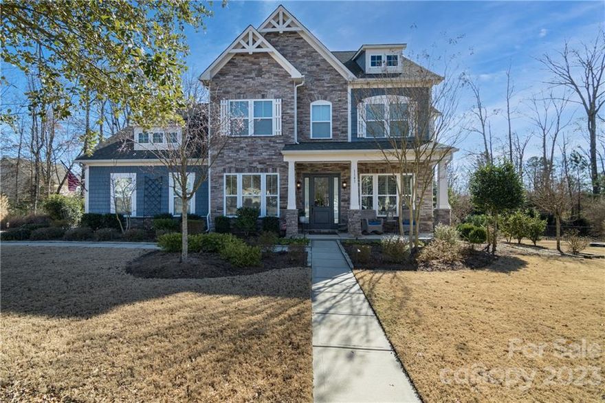 Meticulously maintained, stunning, one-of-a kind Lake Ridge Enclave pool home! This one has it all! Two fireplaces, custom pool and landscaping, and upgrades galore!  Open floor plan with 2 story great room, primary bedroom on main and lovely sunroom. Custom pantry, upgraded kitchen includes large granite island, stainless appliances, double oven with convection, new dishwasher and more! This home boasts gorgeous new LVP throughout both levels and custom lighting.  Upstairs has a second office area with custom built in cabinets, laundry room, loft, 3 bedrooms and 3 full bathrooms. Step outside to your private oasis with custom designed 45 ft long pool with tanning ledge, established palm trees, built in firepit, professional landscaping and plenty of entertaining space! Lake Ridge is in an award winning school district with resort like amenities; this is one you don't want to miss! Close proximity to Lake Wylie, the Catawba River, new Catawba Park and more! See upgrade list in the MLS!