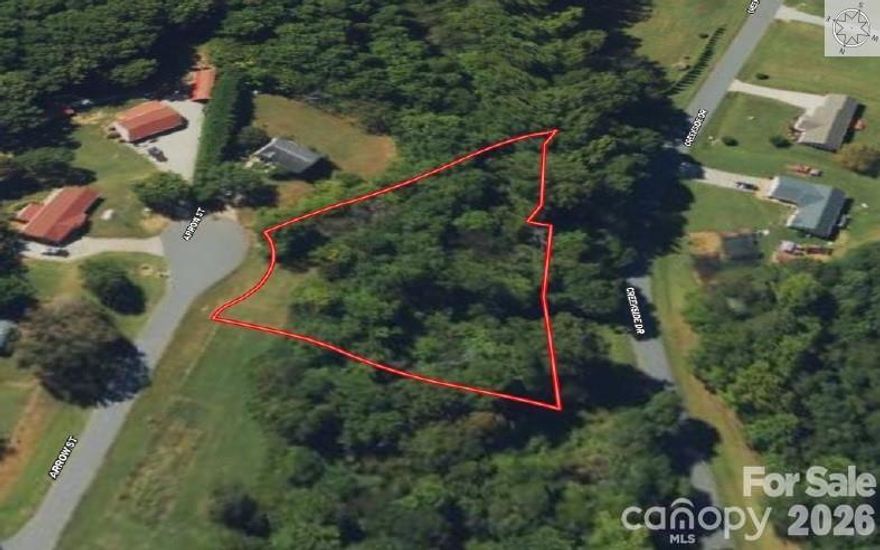 Private cul-de-sac lot for sale near Lincolnton, NC. This lot is located in the established Country Crossing subdivision just off of Highway 182. Lot is wooded, gently sloping and at the end of a quiet street. Lot has been pre-approved for 2-bedroom septic (see preliminary report in attachments). Lot requires a septic drip-system. Neighborhood is on a community well serviced by Aqua America, tap fee & set-up fees required. No HOA or HOA dues! Manufactured homes not allowed. Convenient to Highway 27, Highway 150, Lincolnton & Cherryville.