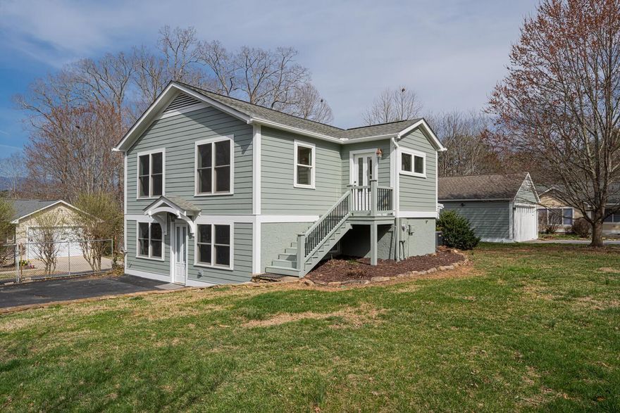Beautifully remodeled home in an established neighborhood close to downtown and Blue Ridge Parkway! Lower level features living room with new carpet, full bath, bedroom, laundry, and ample storage. Upstairs is open with abundant natural light featuring kitchen with breakfast bar, 2 pantries, dining area, bedrooms, and another full bath. Home has been freshly painted inside and out plus home inspection on file with issues addressed. Turn the back yard into your very own, semi private oasis. Oversized garage perfect for vehicles, workshop, studio, etc. Features pull down attic stairs for added storage above. Home has a tucked away feel but located across form the VA Hospital, minutes to downtown, restaurants, bus line, walking trails, BRP, Land To Sea Trail, Nature Park, shopping, and more! Come take a look!