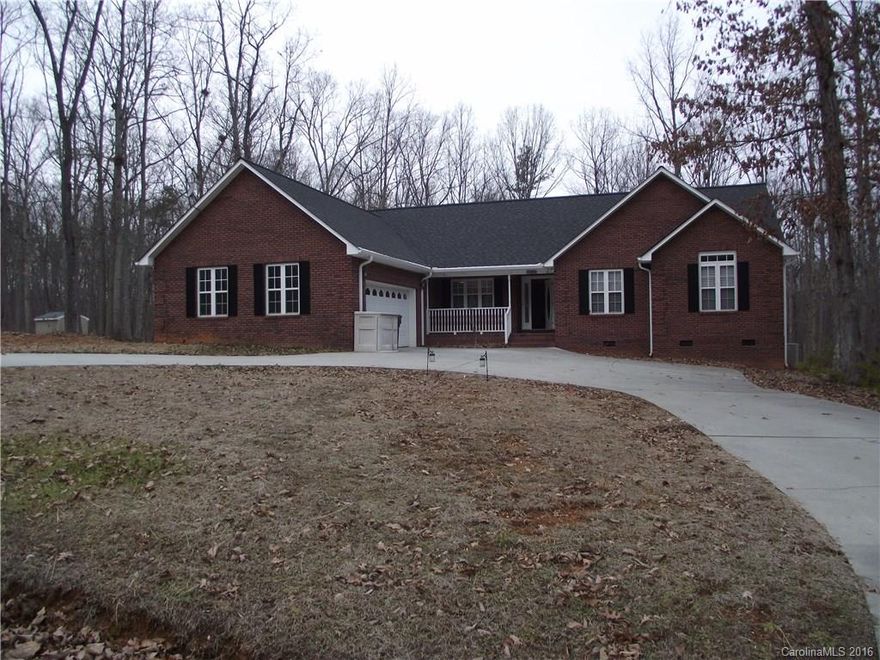 Private country setting on a cul du sac - 3 Bedroom 2 Bath Ranch. Fenced back yard and deck. Lots of living space and office niche. Breakfast area and kitchen counter sitting. Vaulted ceiling and hardwoods. Wood burning fireplace.  Two car attached garage just minutes from Hwy 40.