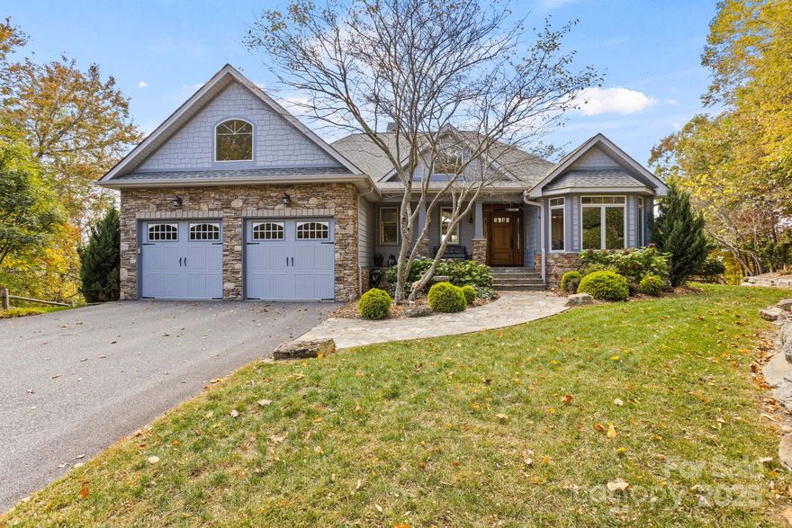 Majestic and expansive multi-range mountain views surround this absolutely stunning home in the highly desirable, gated community of Somersby Park. Prepare to be impressed as you enter the home into a beautifully designed open floor plan-ideal for both relaxation and entertaining. The great room captures the essence of luxury mountain living with its cathedral beamed ceiling and dramatic wall of windows, flooding the space with natural light and showcasing the breath-taking never-ending views. A gorgeous floor to ceiling stone fireplace flanked by built-ins anchors the space, creating a warm and inviting atmosphere. The great room flows seamlessly into the gourmet kitchen, featuring abundant cabinetry with pullouts, honed quartzite countertops, a large island, high-end appliances, including a gas cooktop and double wall ovens plus a breakfast bar and sunny breakfast room surrounded by windows to enjoy the view. The dining room offers tray ceilings and picturesque view of the lush landscaping. The primary suite boasts fantastic views, private deck access, two walk-in closets and spa-like bath with soaking tub, tiled glass shower and double vanity. A powder bath with copper vessel sink and a well appointed laundry room complete the main level. The lower level includes a family room with large windows, wet bar with beverage fridge, two guest bedrooms (one with en suite bath), an additional full bath, office or hobby room and ample storage/workshop space. Enjoy multiple outdoor living areas while relaxing on the main level covered and open decks or the lower level deck and stone patio-all with cable railing and BIG VIEWS! Conveniently located close to town, this exceptional home combines luxury mountain elegance, comfort and spectacular mountain views.