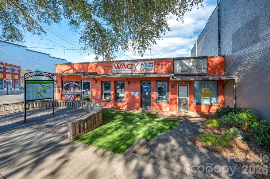 Located in the vibrant, highly desirable business district of downtown Forest City, this versatile 1,704± square-foot commercial property offers an exceptional opportunity for investors and entrepreneurs alike. Situated on W. Main Street within the sought-after West Main Historic District, the property offers outstanding visibility, easy accessibility, and high daily traffic exposure. Currently configured to accommodate three separate business spaces, the building provides flexibility for multi-tenant income, owner-occupied use, or reconfiguration to suit a wide range of commercial needs. An additional potential site on the back of the property allows for further business expansion or development, enhancing its long-term value. With unlimited possibilities for retail, office, or service-based uses, this multi-use property is perfectly positioned in a growing area where location truly matters. Whether expanding an investment portfolio or launching or growing a business, this is a rare opportunity in the heart of downtown Forest City—where location, visibility, and potential come together.