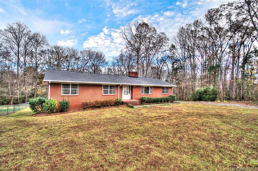 Immaculately maintained ranch on a double lot in Matthews. Large bedrooms, two living spaces, and spacious screened-in porch w/ a love-seat swing overlooking massive back yard. Wood burning fireplace in the family room adds to the overall cozy environment. Unfinished basement also has a workspace. Large lot allows for plenty of space and privacy, but still has a close community feeling.