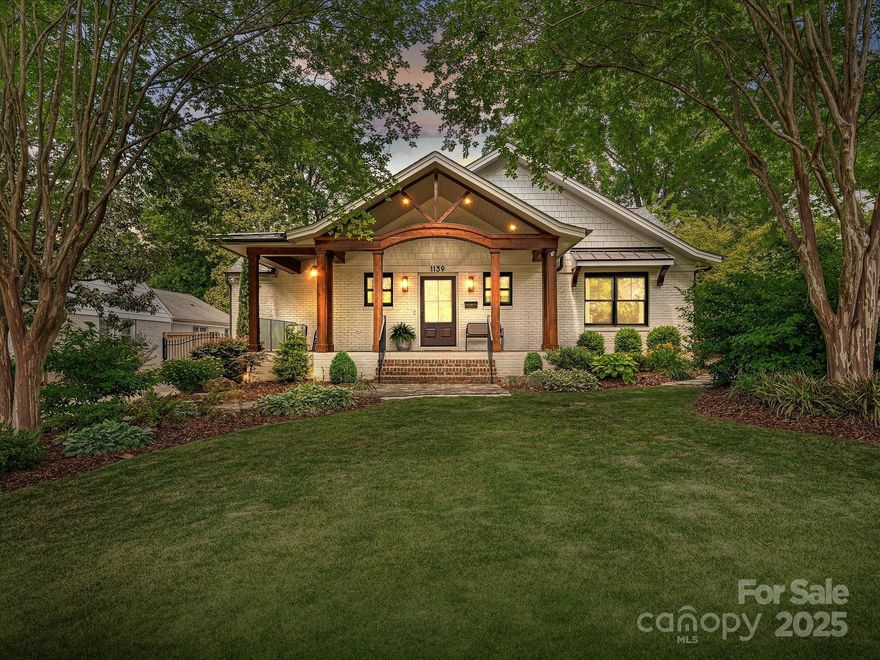 Myers Park home in prime location with easy access to Freedom Park, the Greenway, and top dining and shopping. Thoughtfully renovated with an open layout, 9’ ceilings and gorgeous finishes throughout. The chef’s kitchen features a quartzite island with bar seating, a 48” Wolf range, oversized fridge/freezer, custom cabinetry. A chic scullery offers incredible storage, extra counter space, open shelving & a beverage fridge. The spacious great room opens to a vaulted, covered outdoor patio with a wood-burning fireplace—ideal for year-round entertaining. Retreat to a luxurious primary suite with a vaulted ceiling, spa-like ensuite bath finished with dual vanities, a soaking tub, and dual closets. Both secondary bedrooms have beautiful fully updated bathrooms. Functional touches include a back-entry drop zone with a built-in desk nook, a generous laundry room with storage and an electric gate enclosing the fully fenced back yard. Welcome home!