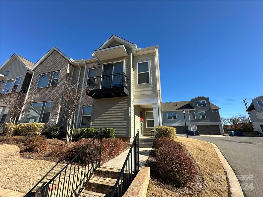 This stunning unfurnished 3-story townhome in Charlotte, NC, offers versatile living & modern design. This home showcases an open floor plan & excellent views of Uptown Charlotte & walkable to Camp North End. The main level features luxury vinyl plank & tile flooring, motorized blinds, & a sleek kitchen outfitted with stainless steel appliances, a farmhouse sink, a gas range, tile backsplash, & walk-in pantry. The layout provides both function & flexibility, with two bedrooms on the first floor, a luxurious primary suite on the second floor, & a spacious third-floor loft that can serve as a bedroom, home office, or additional living space. Additional highlights include a wood staircase, abundant natural light & contemporary finishes throughout. The 2 car garage has extra storage space & 2 EV charging stations. This home blends modern design, adaptable living spaces & unbeatable city views, making it a perfect retreat for those seeking comfort, style, & urban convenience.