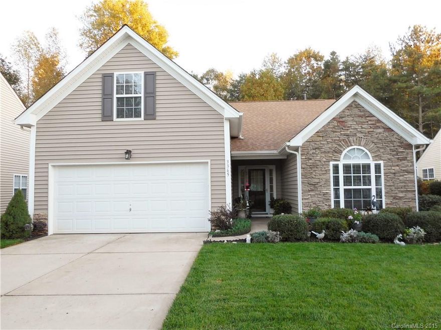 This house has it all. Curb appeal with the Stone accent on front. Great Room concept, Gas Logs, Vaulted Ceilings in most rooms, Entry Hall, Large Master Bedroom with Sitting Area,  4th Bedroom/Bonus, Split floor Plan, Laminate Flooring Downstairs, Porch on Back and a Wonderful Fenced Back Yard with Trees. The Open Floor Plan makes this home feel warm and inviting. The Back Porch is Private and a Relaxing place to sit and look out upon the trees.