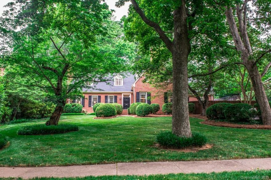 Lovely Myers Park home on Queens Road East, one of Charlotte's most beautiful streets.  Brick 1.5 story home built in 1955 sits on .57 acre lot. 4 Bedrm, 4 Bath, 9'6" ceiling heights down, foyer with curved stairway, beautiful large living areas, paneled study with French doors to patio, remodeled kitchen, Large den & full bath  could make for a Master on the first floor. Private backyard with heated salt water pool, hot tub & cabana with a full bath. A wonderful home with a great floor plan!
