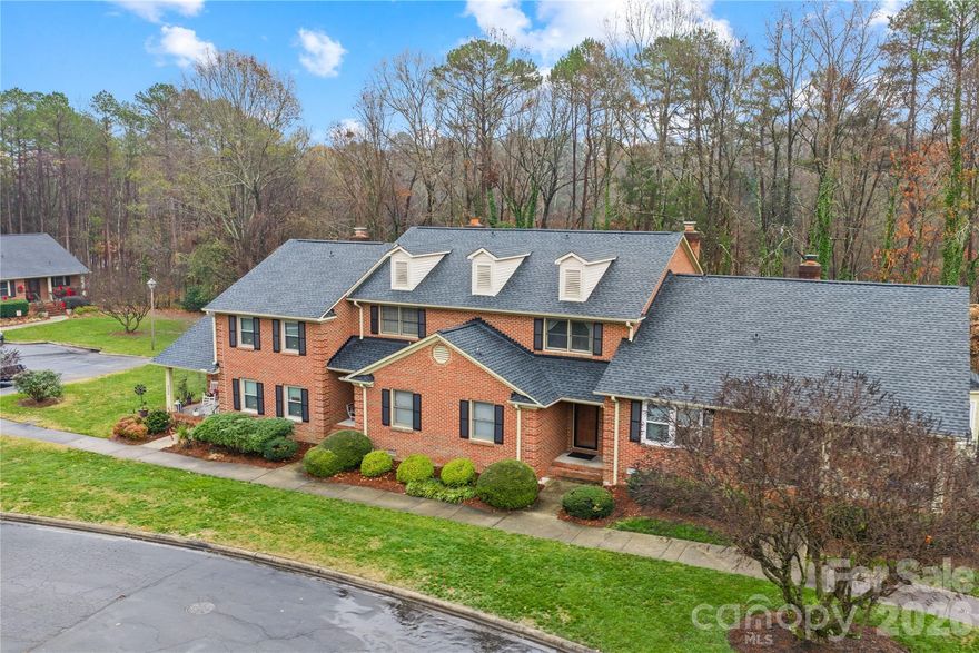 Welcome to 8430 Coulwood Oak Lane, a cozy and welcoming two-story townhome nestled in the desirable Coulwood Oaks community of northwest Charlotte. This charming residence offers two spacious primary bedrooms, each with its own private en-suite bathroom, plus an additional half bath on the main level—perfect for guests and everyday convenience.

The main floor features a large kitchen with ample counter space and an eat-in dining area, ideal for both casual meals and entertaining. The inviting living room is centered around a wood-burning fireplace and opens through a glass door to a private, gated back patio, providing a relaxing outdoor retreat.

Comfort is ensured year-round with two heat pumps, offering efficient heating and cooling—one dedicated to the upstairs and one to the downstairs. The home also includes two designated parking spaces, along with convenient visitor parking nearby.

Coulwood Oaks is a secluded community, enclosed by quiet zones and mature trees, creating a peaceful setting while still offering exceptional accessibility. Residents enjoy quick access to Brookshire Boulevard (NC-16) and I-485, making the commute to Uptown Charlotte approximately 15–25 minutes, depending on traffic. Shopping, dining, parks, and outdoor attractions—such as the U.S. National Whitewater Center—are all just minutes away.

With its thoughtful layout, private bedroom suites, modern comfort features, and prime location, this home offers an ideal blend of comfort, convenience, and Charlotte living.