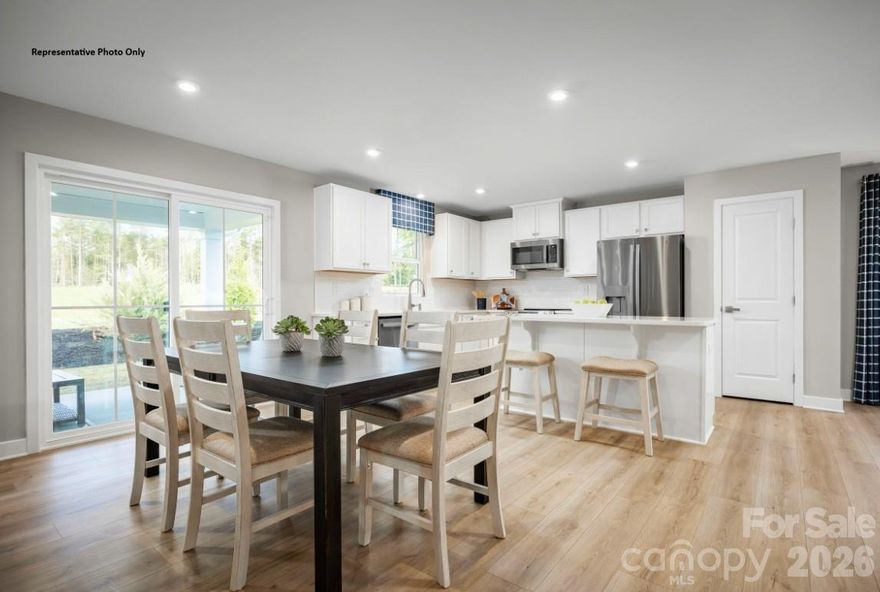 Laney Farms combines thoughtfully designed new homes with a location that offers both convenience and small-town appeal. Situated in Pageland, the community provides easy access to Monroe, Waxhaw, and major commuter routes while maintaining a relaxed residential atmosphere. Planned neighborhood amenities support an active and connected lifestyle. The Grand Cayman floorplan offers spacious ranch-style living with an open-concept design that connects the kitchen, dining, and living areas into one cohesive space. Generously sized bedrooms and ample closet storage provide flexibility for a variety of living arrangements, from hosting guests to creating a home office or hobby space. The primary suite features a walk-in closet and private bath for added comfort. Buyers may receive closing cost assistance when using the preferred lender, helping make homeownership more accessible. Schedule your visit today to learn more about Laney Farms and explore available homes.