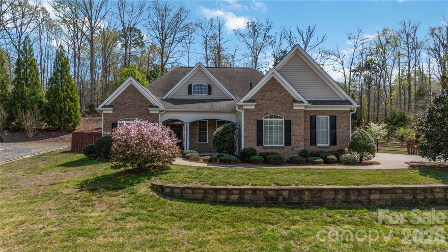 Welcome to a classic brick beauty that checks every box.  Over 2,300 square feet of living space with this 3 bedroom, 2 bath home that has been meticulously cared for.  It sits on almost 2 acres that offers great outdoor living with screened in porch and patio.  Inside you'll notice the natural light shining in on the beautiful flooring that was updated in 2023.  The warmth of the fireplace makes you feel right at home and the living room blends into the dining room so plenty of room for entertaining and relaxing.  This beautiful kitchen features double ovens, plenty of cabinetry to keep all your kitchen tools hidden and great counter space to prep all those favorite dishes.  A spacious primary suite with views outside and large en-suite featuring soaking tub and separate shower.  Versatile laundry room with extra storage cabinets and sink.  Want the opportunity to create your own area - it's got that too with a huge unfinished bonus room.  2 car garage features a 220 voltage outlet too!  Come see why 345 Clarendon Estates Drive will be your next address! HOME IS BACK ON THE MARKET AT NO FAULT OF THE SELLERS, BUYER’S CONTINGENCY COULD NOT BE MET