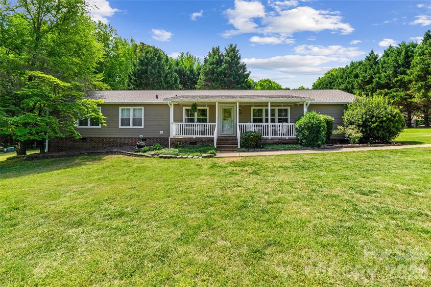 Set on five beautiful acres, this spacious 4 bedroom with 3 full baths offers the perfect blend of privacy and modern updates. Recent improvement provide peace of mind, including a new roof and gutters (2025), new LVP flooring (2024), and a new well pump (2020). The thoughtfully updated primary bathroom (2016) adds a touch of comfort, while gas on demand ensures efficiency for everyday living. 

Enjoy the outdoors from the stunning, expansive back deck (2026) and firepit--perfect for relaxing or entertaining--overlooking the serene property. With plenty of space both inside and out, this home offers the lifestyle you've been looking for.