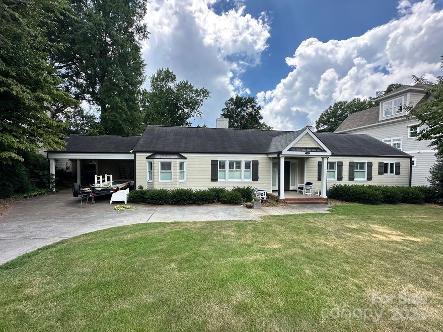 Spacious 100 foot wide lot in the heart of Myers Park located just steps away from the Greenway. Home being sold for the land, as-is.