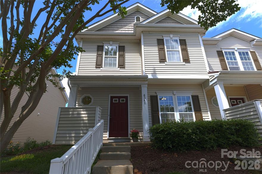 Located in the heart of Indian Land, this two-bedroom, two-bath end-unit townhome offers a well-planned layout with thoughtful updates and easy access to everyday amenities. Nearby highlights include Walnut Creek Park, High Seas Miniature Golf, RedStone 14 Cinemas, Lore Brewing Company, and Springfield Golf Club!  The main level features an open-concept floor plan with an abundance of natural light, updated laminate wood flooring throughout, etc.. Just off the entry is a dedicated home office. The dining area includes a side wind; an added feature not found in all end units; flowing seamlessly into the living room and kitchen. The living room is anchored by a fireplace, and framed by oversized windows, with two flanking the door leading to the back patio. The patio is partially enclosed by a privacy fence, creating a comfortable outdoor extension of the living space. The kitchen offers ample counter space and cabinetry, along with a pantry for additional storage. Upstairs, both bedroom suites include ensuite baths with tub/shower combinations, walk-in closets, and recently replaced toilets. Additional updates throughout the home include several replaced ceiling fans and flooring within the past few years. Major system updates include a water heater (2024) and an HVAC system (2025.) Community amenities include a clubhouse, outdoor pool, and picnic areas, adding to the overall ease of living in this location.