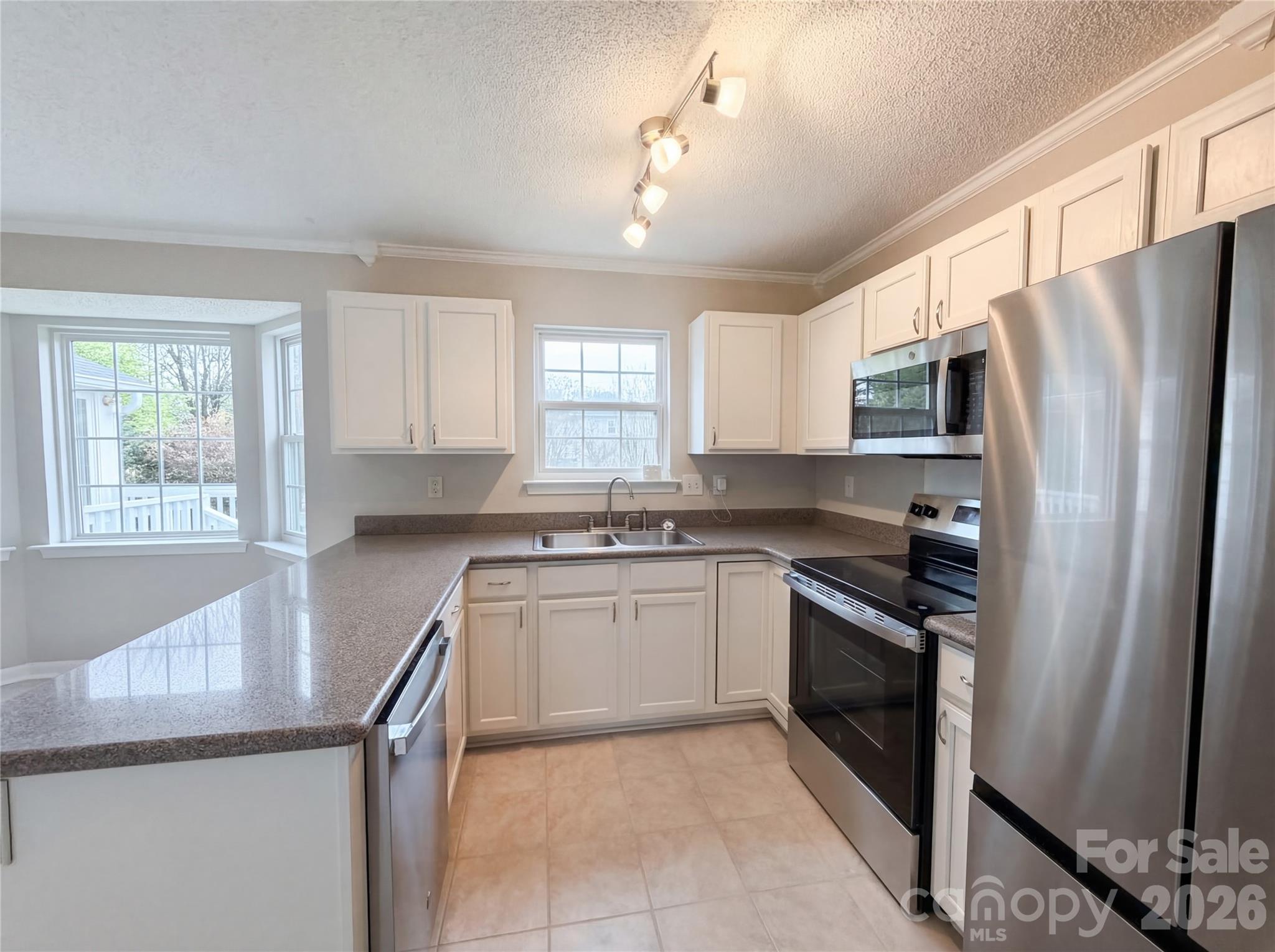 9907 Wildwood Muse Court