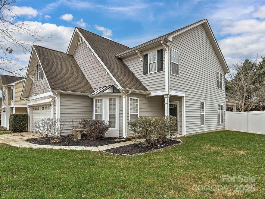 Welcome to this inviting 3-bedroom, 2.5-bath home in the heart of Fort Mill. This two-story layout features a sought-after primary bedroom on the main floor and fresh LVP flooring throughout the main living area. The kitchen shines with new appliances, while a laundry room offers added storage and convenience. Upstairs, two additional bedrooms and a full bath provide flexibility for guests, office space, or hobbies. Step outside to a private, fully fenced backyard with a 6-ft privacy fence—ideal for relaxing, entertaining, or pets. Additional upgrades include a new hot water heater and a 220-volt charging station in the two-car garage. The neighborhood pool is conveniently located right across the street. Please note: the community maintains a no-rental policy. Enjoy comfortable living close to Fort Mill’s dining, shopping, and commuter routes.