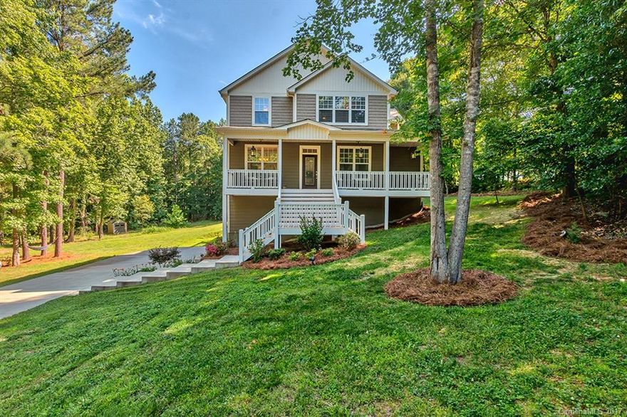 This incredibly rare home on 4 acres in Fort Mill features a creek, beautiful woods and walking paths. The 4 bedrooms, 3.5 baths and unfinished basement rough plumbed for future expansion gives you all the living and storage space you could need. The large open kitchen and great room with wood burning fireplace is the perfect place for all your indoor entertaining and the large covered patio and deck allows you to enjoy the outdoors as well. Covenants allow for horses on lots 5 & 6, no HOA dues!