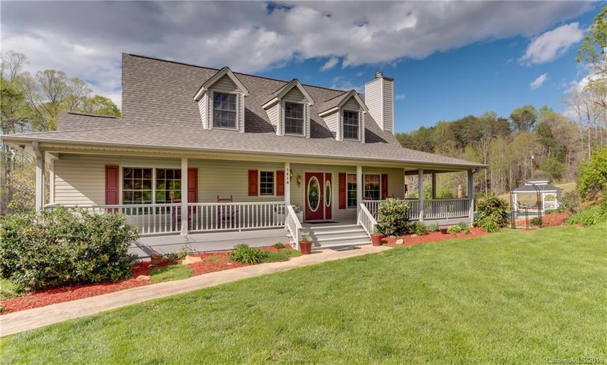 Think Tucked Away - REDUCED! Nestled in a grassy knoll, this 2B/3BA home sits on over 10 ac of pastures, & hardwoods.  Enjoy listening to the quick flowing stream from the large back screen porch. Open floor plan, gas FP, expansive kitchen island & main flr master suite are a few of the amenities in this lovely home. Plus, an inviting pool sits just off the deck. The handy barn has 3 matted 12x12 stalls w/ an attached 1B/1BA apt. - smartly appointed w/rough board walls & full kitchen.