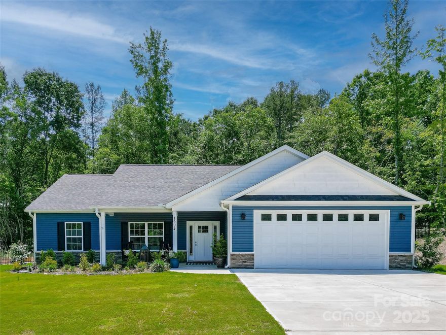 Experience the best of modern living and privacy in this like-new ranch home on 1.84 acres, built in July 2023. With no HOA, enjoy freedom and space in a peaceful setting. This open-concept, one-level floor plan features a stunning kitchen with a large island and white granite countertops. A spacious primary suite with a walk-in closet is on one side of the home. Ensuite features double vanity and a modern tiled shower with glass door enclosure. 2 bedrooms are on the opposite side of the home and share a hall bath.  Maintenance-free, rich-tone plank flooring is throughout the home. Relax on the beautiful screened-in patio or tend to your garden in the spacious fenced yard, complete with a large new potting shed & an irrigated front lawn. The oversized garage offers ample storage and an extended driveway affords plenty of room for parking! Everything you need for comfortable, stylish living! Conveniently located off Hwy 9, 5 minutes to shopping and dining. Schedule your showing today!