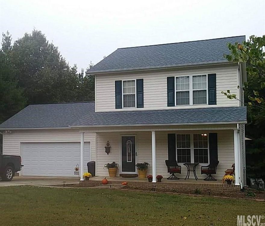 Explore country living in a location convenient to the heart of Hickory or Lenoir!  This beautiful 2 story home is truly a gem!  The covered front porch offers solitude in a quiet culdesac setting.  Step inside to a spacious great room with large windows for natural sunlight.  The living room is open to the dining area, presenting chair railing and a rear door leading to the private deck.  The kitchen boasts beautiful granite tops, pantry, garbage disposal,  tile backsplash and stainless steel appliances.   The lower level includes a convenient half bath.  The upper level highlights three bedrooms.  The master bedroom features a master bathroom and  double walk-in closet. The lot is level with gentle slope in rear and offers nice play set area.